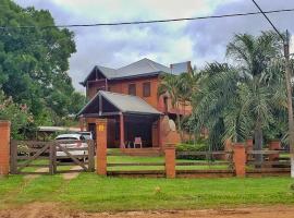 Incredible house nearby the river, hotel na praia em Paso de la Patria