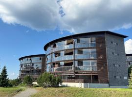 Tahko SPA Junior Suite Orange B11 with Mountain View, hotel com piscina em Tahkovuori