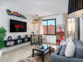 Condo in Gueliz inspired by motorsports, acomoda&ccedil;&atilde;o em condom&iacute;nio em Marrakech
