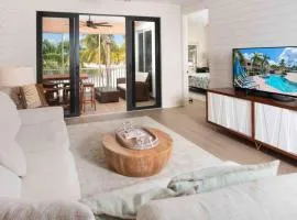 Starfish Kai - Serene Beachfront Condo with Stunning Bay Views & Resort Amenities