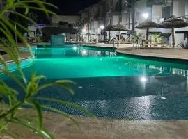 Blue Bay Village Appartement Cocooning en Rez-de-Jardin avec Vue Mer dans une Résidence Sécurisée à Moulay Abdallah près El Jadida