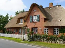 Ferien unterm Reetdach Whg 02