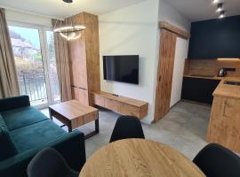 Apartamenty Nad Potokiem koło Karpacza, hotel u gradu Staniszów