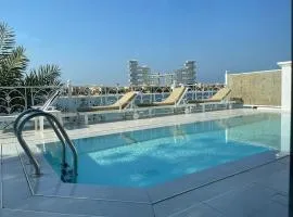 Palm Jumeirah Beachfront private pool villa 5 BR & 1 maids room with access to beach
