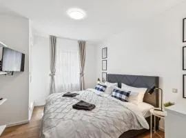 Gelbe Koffer - Comfort Family & Business Apartment in Neunkirchen - 2 SZ - Self-Check-in - WLAN 250 Mbit - Parkplatz - Balkon - Badewanne - bis zu 5 Pers