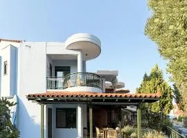 Nikiti Blue house 30m from the beach with sea view
