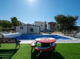 Family-friendly apartments with swimming pools Sukosan, Zadar - 24349