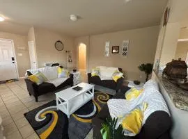 Modern & Comfy 4-Bedroom Home with King Bed, Workspace, & Fast Wi-Fi