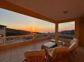 Sunsets and large pool in comfy Villa Avra Arillas