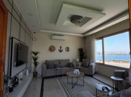 استراحة شاطي النخيل مطله على البحربدون مسبح, accommodation in Ḩaql