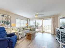 Oceanfront corner condo with sunrise-view balcony, pool & 1-minute walk to beach