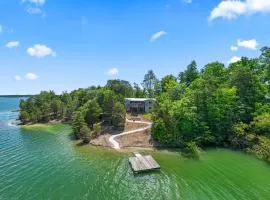 Rustic Lakefront Home with Beach