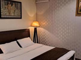 The Sunrise Guest House, хотел в Карачи