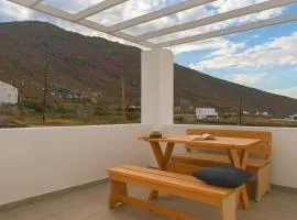 Santorini's Old Mill Serene Getaway by Pori Beach