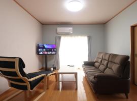 Guesthouse KEN, alojamiento con cocina en Toyama