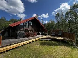 Koselig hytte med usjenert og solrik beliggenhet