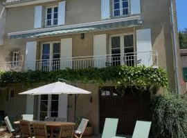Le Caprice garden, river and chateau