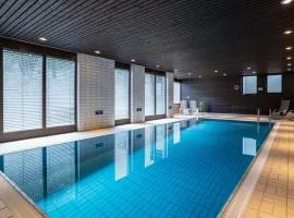 Rosels Mountain Lodge Pool Sauna Bergblick Oberaudorf
