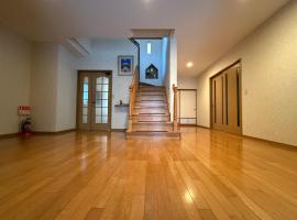 越前海岸 ゲストハウス オーシャンズ Echizen Seaside Guesthouse OCEAN'S, hotel con estacionamiento en Fukui