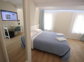 Photomusic Boutique Rooms, ξενοδοχείο στη Σενιγκάλια