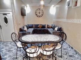 Appartement proche aeroport, alojamiento con cocina en Marrakech