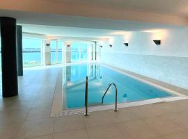 Ferienwohnung direkt am Meer mit Pool und Sauna, Strand fußläufig erreichbar, barrierefrei, ξενοδοχείο σε Kappeln
