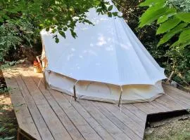 Private Glamping Bell Tent on Wooden Platform in Nature Mountains