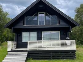 Karnes Lodge, fjallask&aacute;li &iacute; Oksevik