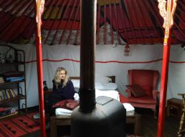 Escape to a cosy Yurt Retreat, glamping site in Mickle Trafford