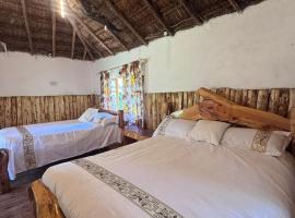 Podocarpus cottages 03, viešbutis mieste Naniukis