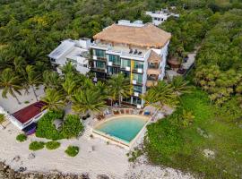 Angelina 28 Beachfront and Family Apartments - Modern and Relaxing Long Stays - 20 min from Cancun Airport