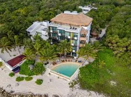 Angelina 28 Beachfront and Family Apartments - Modern and Relaxing Long Stays - 20 min from Cancun Airport