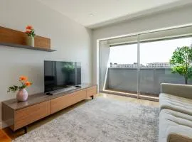 Stylish Home with Balcony & Garage by HostWise