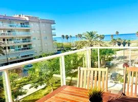 Apartamento 1ª línea playa con piscina y parking