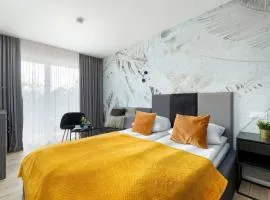 Perłowa Przystań Eleganckie Studio z Parkingiem i Basenem w Kołobrzegu by Noclegi Renters