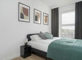 Tasteful Apartment with Parking and Gym by Noclegi Renters