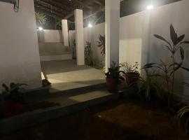 The Eko House, casa rústica em Baía de Arugam