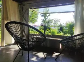 Minimalist riverside hideout