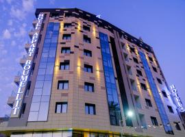 H&ocirc;tel Appart Boumellit Centre Ville Jijel, hotel con estacionamiento en Jijel