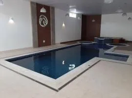 FLAT 410 no Cond Cavalinho Branco em Aguas de Lindoia