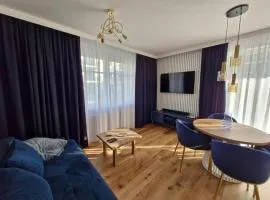 Niebieski apartament w Wileńska Park i prywatne miejsce w garażu podziemnym