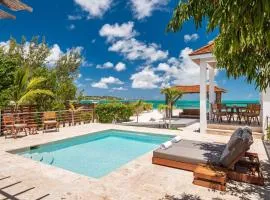 Compact one bedroom villa right on the beach