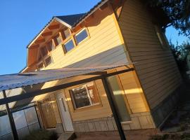 An Dina House, hotel i Dina Huapi