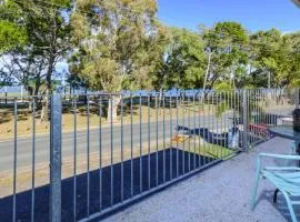 First floor unit close to shops, park and waterfront!