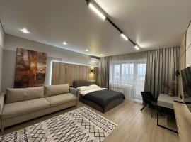 Современные аппартаменты в центре города, hotel in Qostanaj