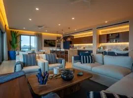 4BR Luxury Beachfront Apt w/ Heated Pool