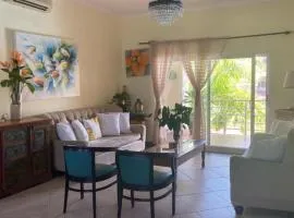 2 Zimmerwohnung, offene Küche und grosser Wohnbereich mit Poolblick in Cabarete wenige Schritte vom Meer