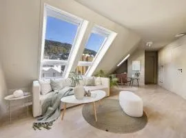 Top-Floor Gem with City Views