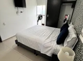 Descanso y Comodidad en Edificio Seguro con Balcón