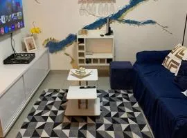 Pé na areia triplex